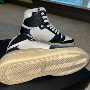 YSL (Saint Laurent)
SL24 High-Top Perforated Leather Sneakers